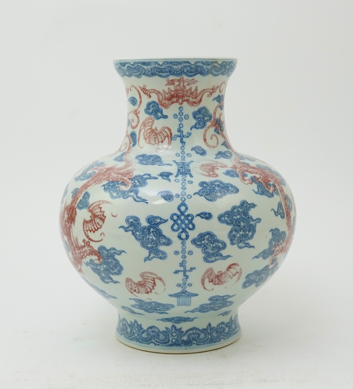 A Chinese underglaze blue and copper red ‘dragon’ vase, Qianlong seal mark but early 20th century